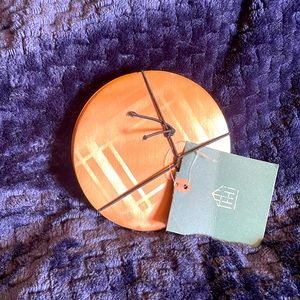 Set of 4 copper colored coasters